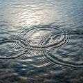 Water texture reflects light highlighting the intricate patterns formed by Royalty Free Stock Photo