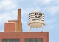 Water tower above the Adam Hats Building in the Deep Ellum section of East Dallas, Texas.