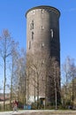 Water tower and cyclist in the Dutch city Heerlen