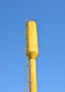 A water tower is an elevated structure supporting a water tank constructed at a height sufficient to pressurize a water supply Royalty Free Stock Photo