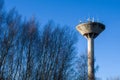 Water tower and many communication antennas mounted on top Royalty Free Stock Photo