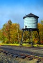 Water Tower next to Train Tracks Royalty Free Stock Photo