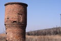 Water tower. An old large ruined building.