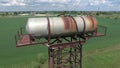 The water tower. An old rustic communal communication. The water tower Royalty Free Stock Photo