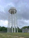 Water Tower and Outbuilding. Royalty Free Stock Photo