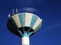 Water tower in perspective with antennas Royalty Free Stock Photo