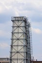 The water tower is steel construction protected by slate. Construction technology. Industrial architecture. Working space. Royalty Free Stock Photo