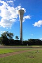 Water tower under clouds and blue sky at Darwin Airport, Australia. Royalty Free Stock Photo