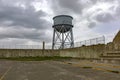 Water tower in the yard of the Alcatraz federal prison, located on an island in the middle of San Francisco Bay, California, USA. Royalty Free Stock Photo