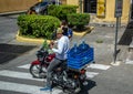 Water transport on motorbike, La Antigua, Guatemala