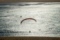 Paraglider over dunes and water at the Dune of Pilat Royalty Free Stock Photo