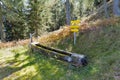 A water trough for wildlife in Alps mountains Royalty Free Stock Photo