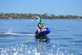 Water tubing skiing teen boy Royalty Free Stock Photo