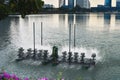 Water turbines (hydraulic turbine) to increase oxygen and purify a fish pond in Bangkok, Thailand