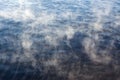 Water vapor on surface of cold water Royalty Free Stock Photo