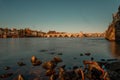 Water view on the historical skyline of Maastricht with the old bridge connecting two parts of town crossing the river Meuse. Royalty Free Stock Photo