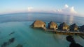 Water villas in the ocean with steps into turquoise lagoon, Kuredu, Maldives