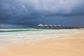 Water villas in the ocean with steps into turquoise lagoon, Kuredu, Maldives Royalty Free Stock Photo