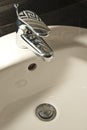 Water wash basin spout