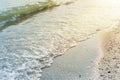 Water wave over sand beach