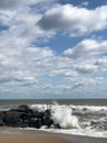 Water waves rushing in sand off the New Jersey Shore Royalty Free Stock Photo