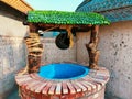 Water well design decorative well fantasy wishing well puits deau, pozo, poco agua, wunschbrunnen, kunwa image photo Royalty Free Stock Photo