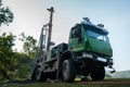 Water well drilling rig preparing to boring dowin into the earth. Royalty Free Stock Photo