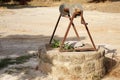 A water well with an old bucket Royalty Free Stock Photo