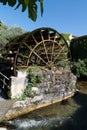 Water wheel on the city canal L`Isle-sur-la-Sorgue Vaucluse France Royalty Free Stock Photo