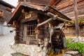 Water wheel and log cabin in Grimentz, Switzerland