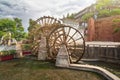 Water wheel is a symbol of Lijiang old town ,Yunnan, China. Royalty Free Stock Photo