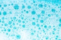 water with white foam bubbles.Cleanliness and hygiene background. Foam Water Soap Suds.Texture Foam. blue soap bubbles Royalty Free Stock Photo