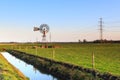 Water windmill in a dutch landscape Royalty Free Stock Photo