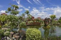 Water windmill in the garden. Royalty Free Stock Photo