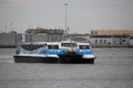 Waterbus arriving at the RDM complex in the Heijplaat harbor of the port of Rotterdam. Royalty Free Stock Photo