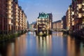 Watercastle in Speicherstadt Hamburg Germany in the evening with beautiful illumination. Royalty Free Stock Photo