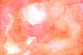 Watercolor abstract background with gentle orange and pink colors