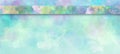 Watercolor background in pastel blue purple pink and green romantic colors and soft watercolor wash texture with colorful ribbon o