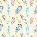 Watercolor bird feathers seamless pattern in pastel colors on yellow background. Hand drawn ethnic tribal illustration in boho sty Royalty Free Stock Photo