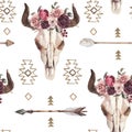 Watercolor boho seamless pattern of arrows, bull skull with horns & floral arrangement on white background