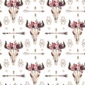 Watercolor boho seamless pattern of arrows, bull skull with horns & floral arrangement on white background