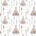 Watercolor boho seamless pattern with teepee, arrows, feathers.