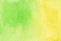 Watercolor bright green and yellow background texture. Stains on paper Royalty Free Stock Photo