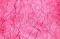 The watercolor is a bright pink color with a textured background. Crumpled paper