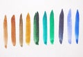 Watercolor bright strips on a white background. Green, blue and