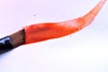 Watercolor brushstroke, alizarin crimson and cadmium red