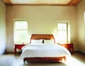 Watercolor of Bungalow bedroom with empty wall Royalty Free Stock Photo