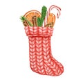 Watercolor Christmas sock decor illustration. Hand painted red knitted stocking with dried oranges, candy cane, fir