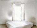 Watercolor of A completely white bedroom with window covered by a