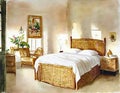Watercolor of A cozy Bedroom with a wicker headboard and chintz